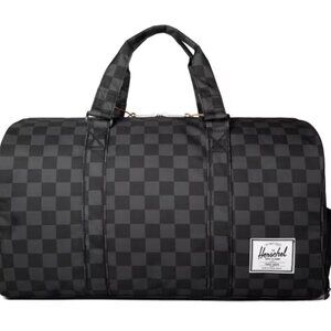 Herschel Supply Co. Novel Duffle Bag In A Black Checkerboard Pattern
